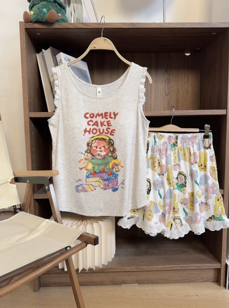 莫代尔夏季女士时尚油画卡通带胸垫短袖长裤休闲家居服