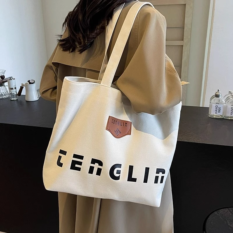 帆布包女通勤简单大方手提托特包上班加厚耐磨单肩包大容量包包