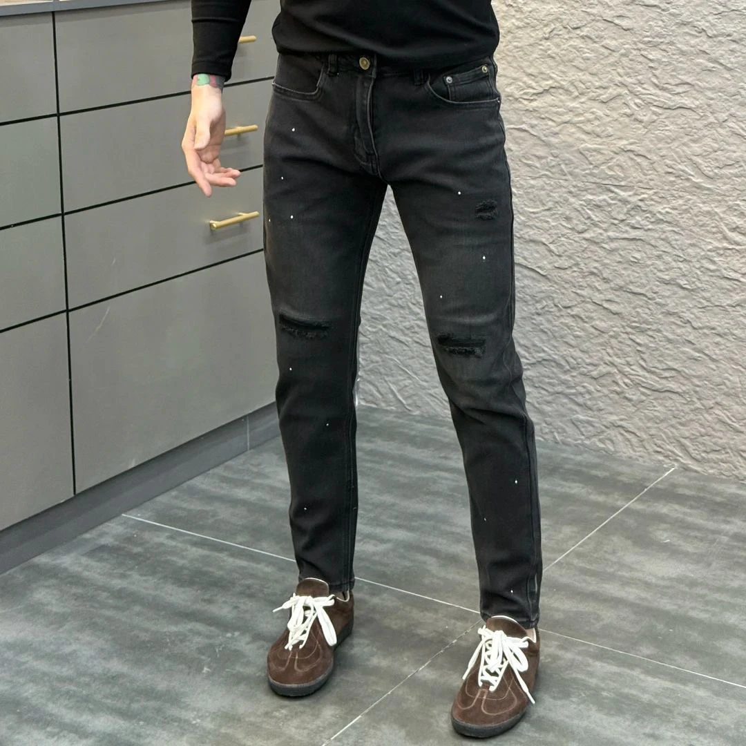 黑色弹力破洞牛仔裤男潮牌泼墨漆点设计款春季新款时尚修身小脚裤