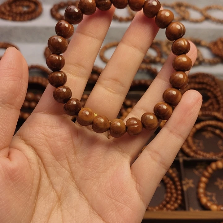 果皮天然库克精挑屁桃8*9单圈手串