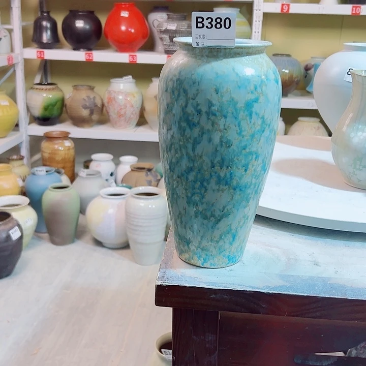 花瓶白泥高30口10。380。有孔