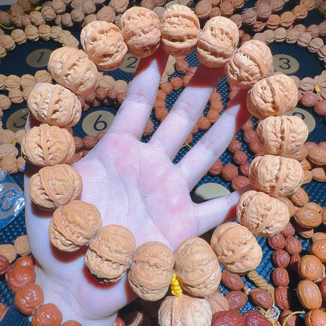 蓝**湾文玩核桃吊坠磨盘京八棱手持