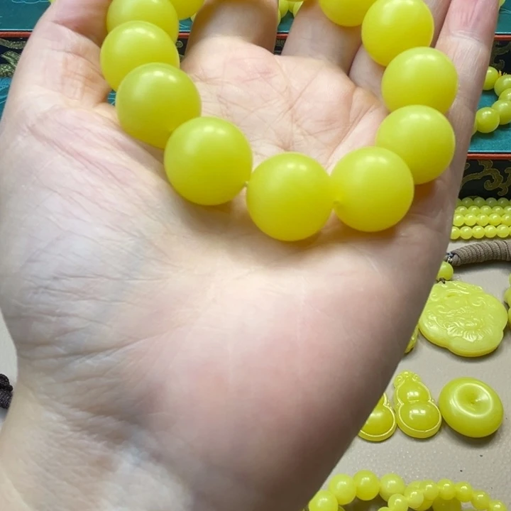 用***4非金属新疆若羌黄口手串