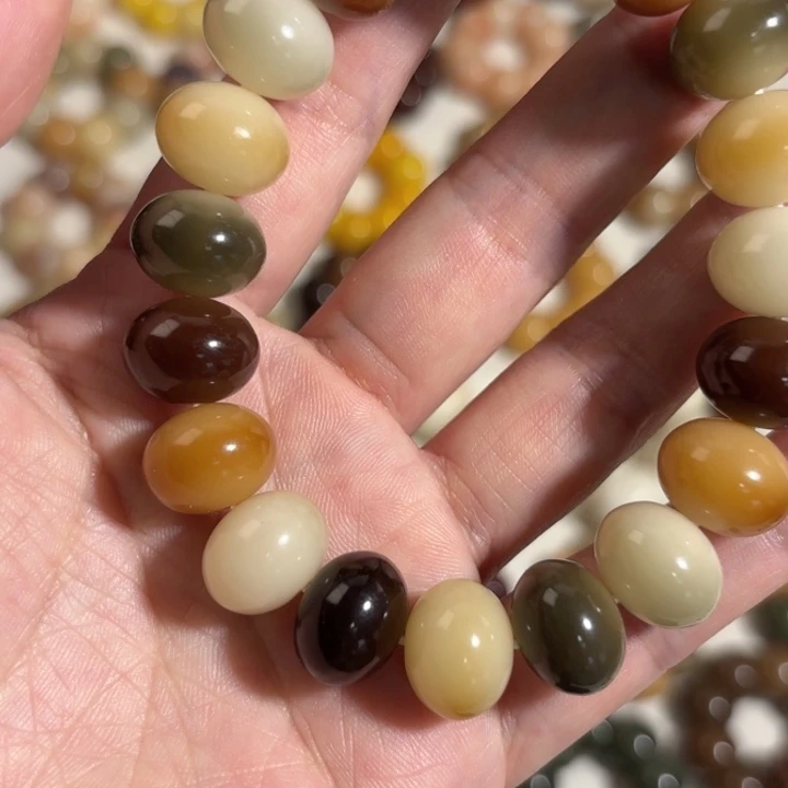 咸***条吊坠菩提根/象牙果