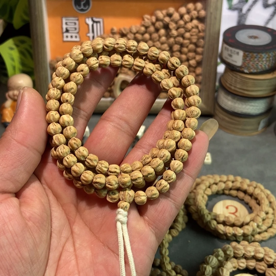 枷***锁吊坠柏香籽/百香籽