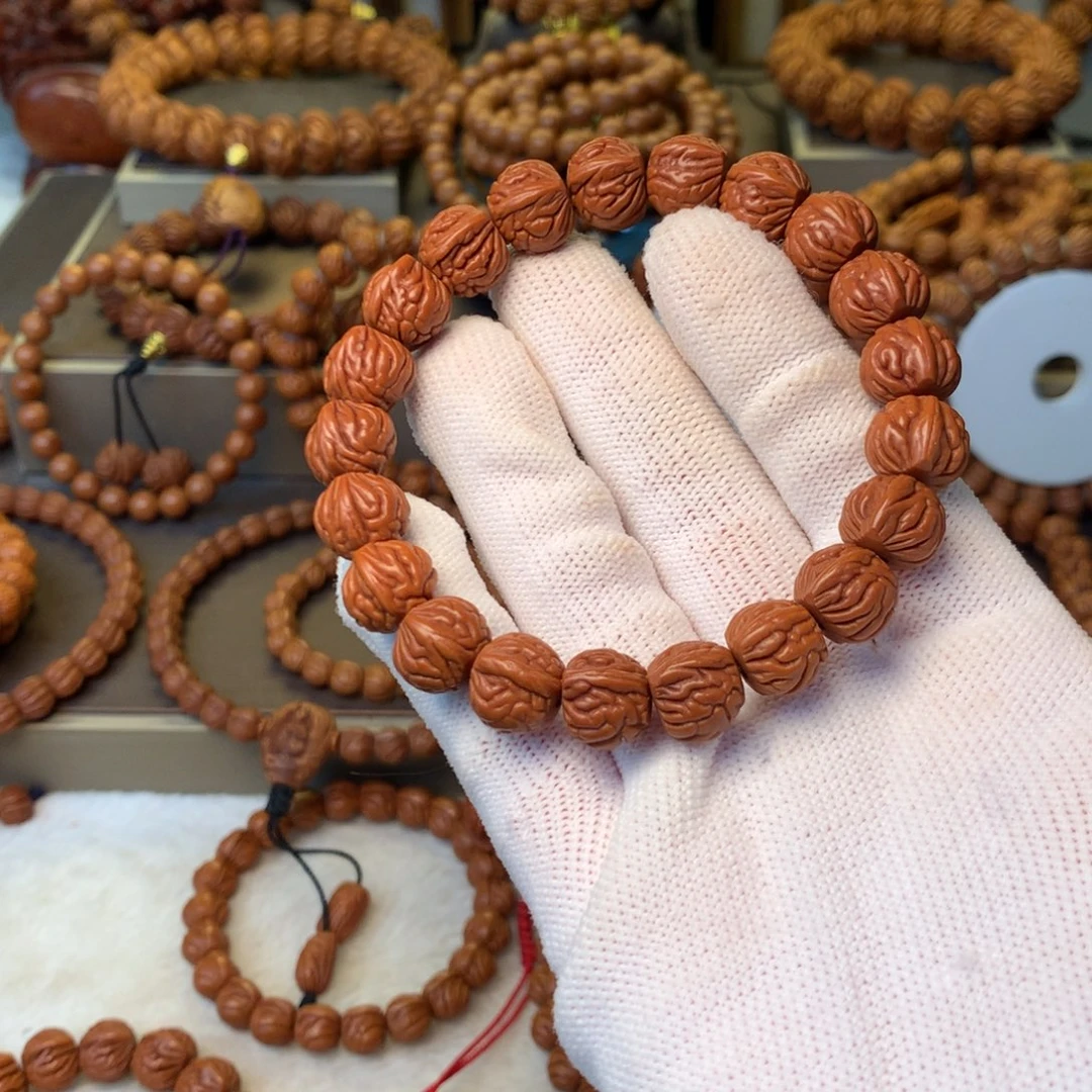 洋***哥桃核手串秦岭龙纹