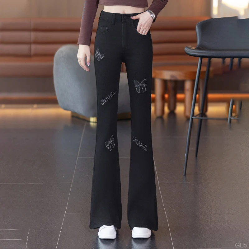 刺绣时尚高腰牛仔微喇裤女2025秋季新款中年妈妈大码黑色喇叭长裤