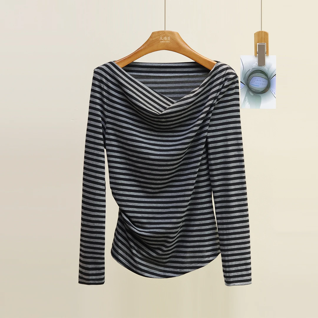 韩版时尚条纹一字肩修身收腰长袖t恤女2025秋休闲松弛感斜肩上衣