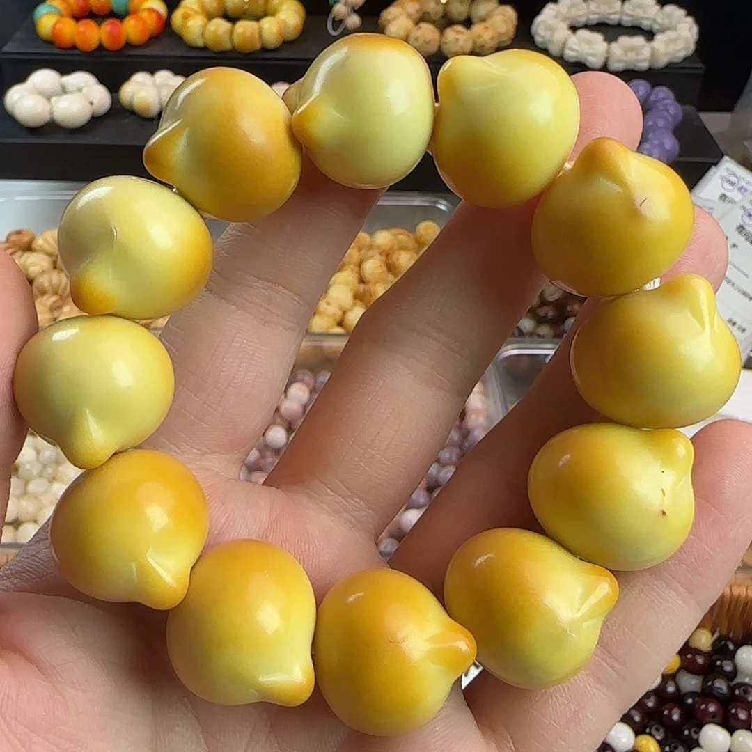 菩提根/象牙果手串微瑕疵炭烤猫头手串一条
