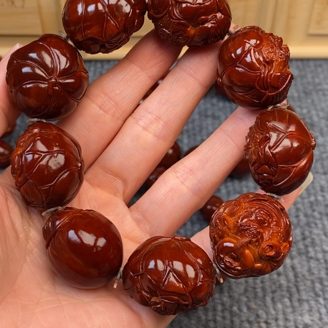 姓***总橄榄核手串/手链荷叶龙财