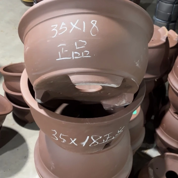紫砂花盆100-3。