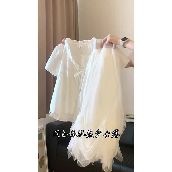 白色上衣2025中长款a字裙甜美仙女长裙温柔不规则百搭半身裙女
