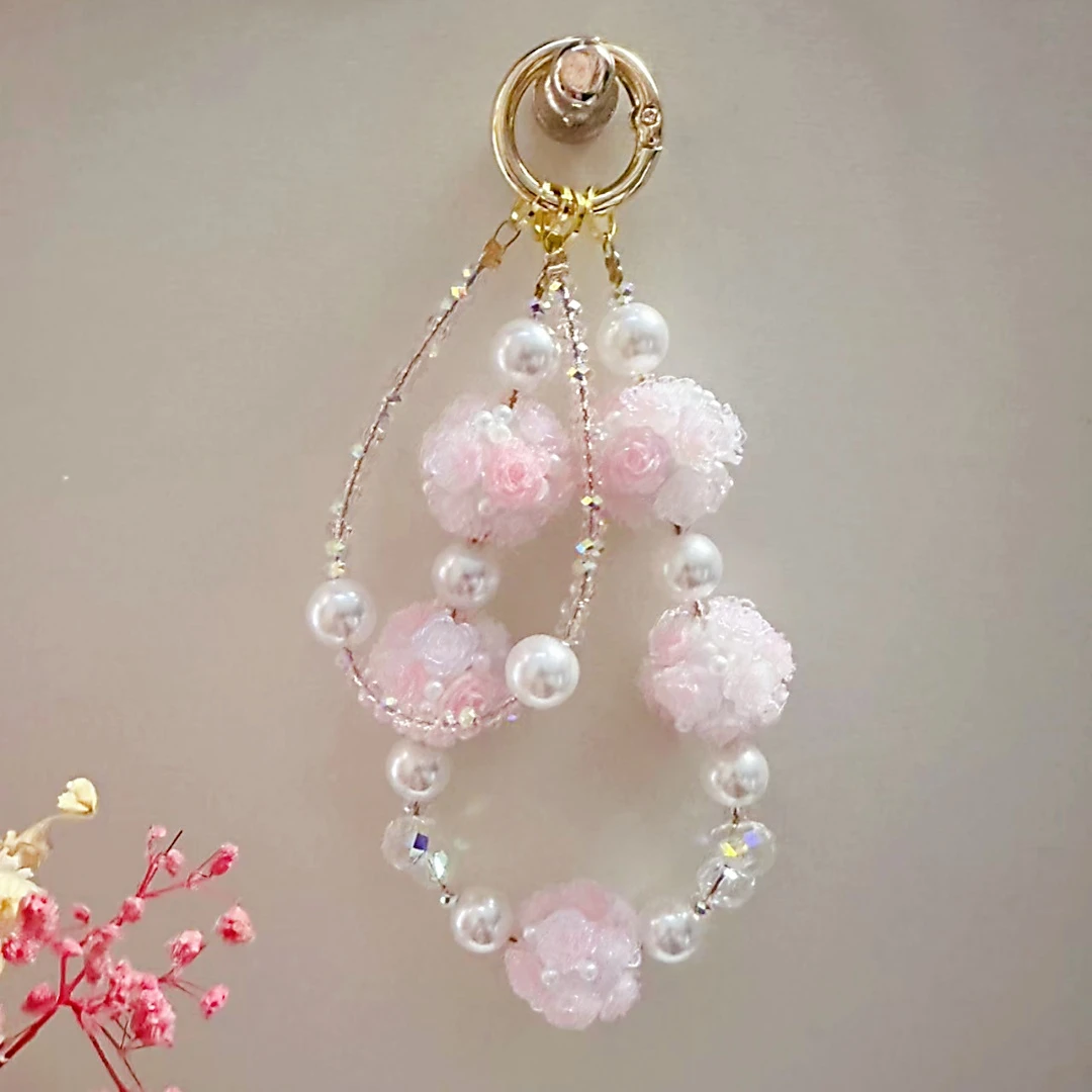 258夜光变色花球手机链女款手工短款防丢创意