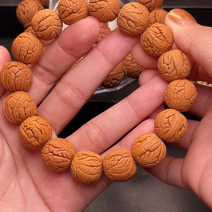 手串桃核金丝龙珠1.6