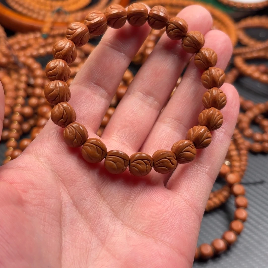 吊坠桃核玉龙脊手串