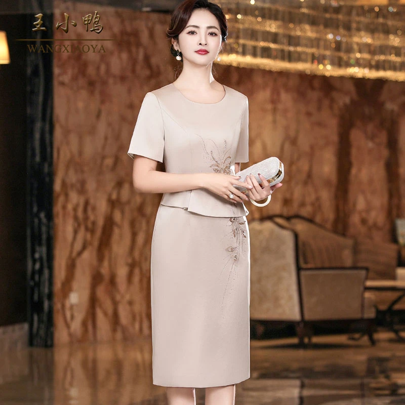 王小鸭连衣裙女2025春夏新款经典气质敬酒服简约显瘦轻奢高端长裙