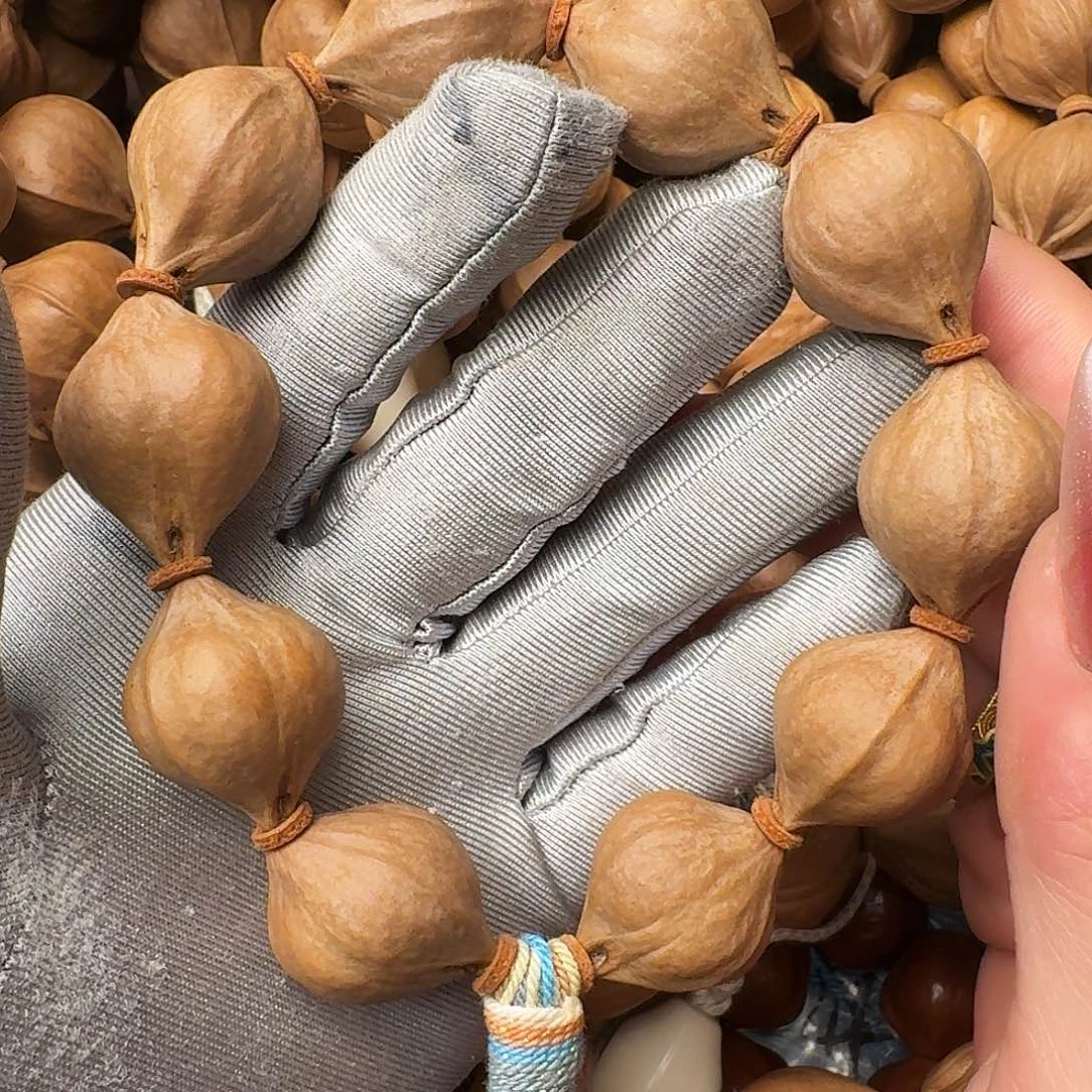 把件橄榄核三面佛