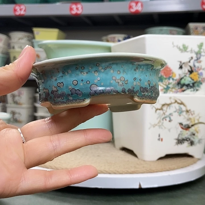 宜兴紫砂花盆盆景艺术