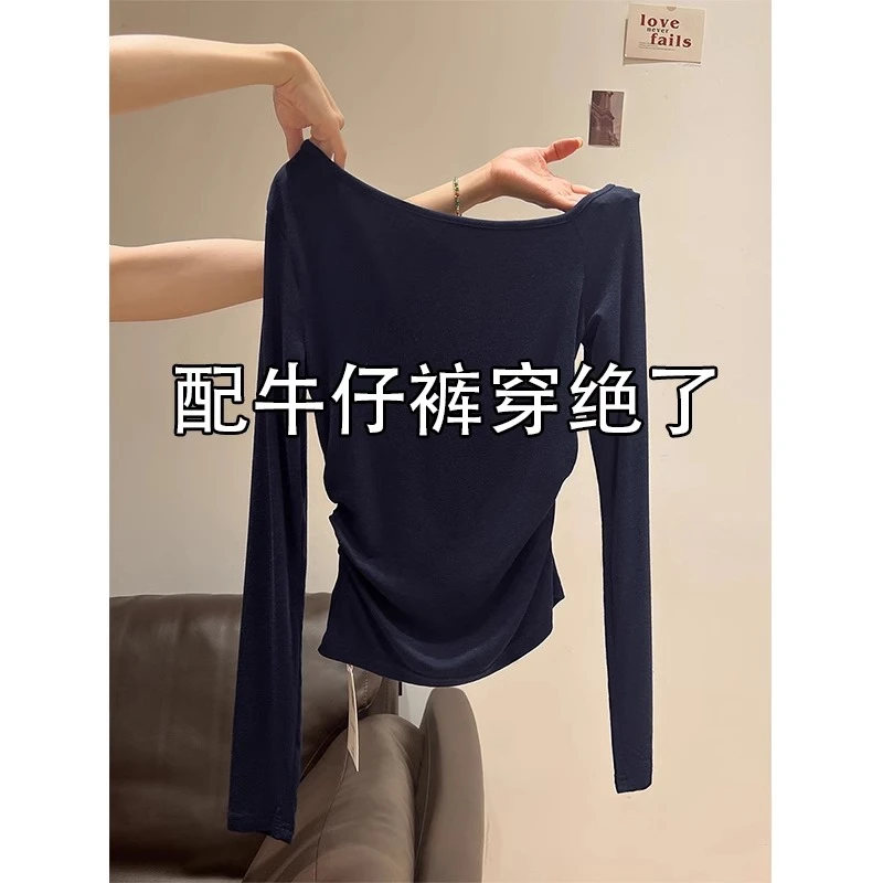 藏蓝斜肩长袖T恤女2025春秋新款修身内搭打底衫褶皱收腰辣妹上衣