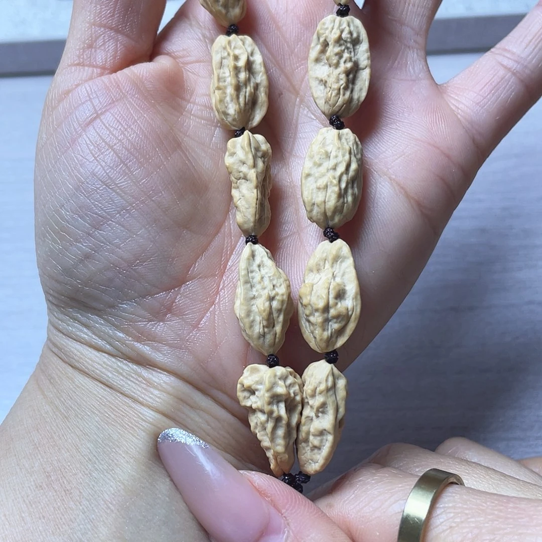 狼***牙吊坠文玩核桃手持