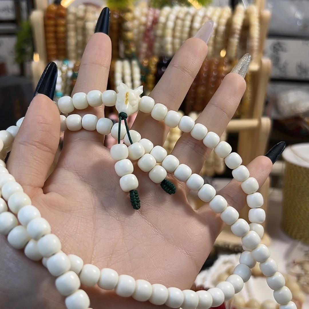 萝***仔吊坠桃核鹿角长串