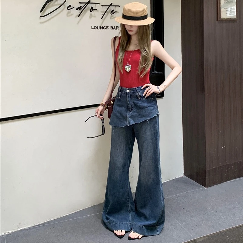 特大码女装不规则毛边裙裤2025夏季屁帘假两件高腰牛仔裤微喇裤女