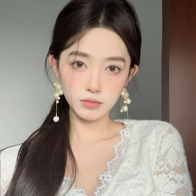 oushipei/欧诗佩 铜合金仿珍珠耳饰 度假风夸张高级感流苏耳环