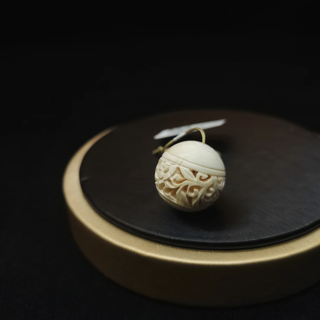 2-51315168 天然猛犸牙～通雕花球281# 尺寸18～20mm