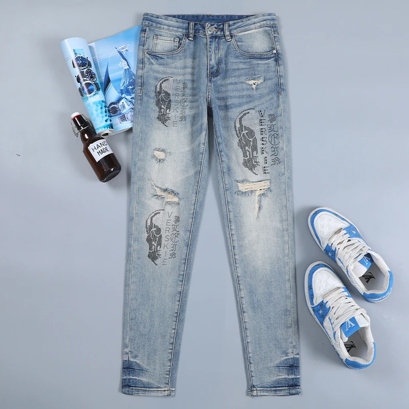 香港高端烫钻破洞牛仔裤男传下潮牌帅气补丁修身小脚休闲时尚裤子