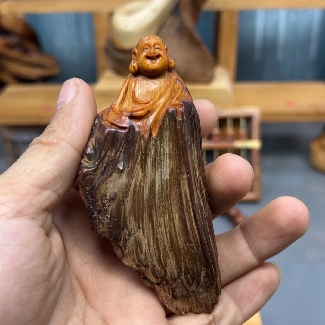 K***觉木崖柏木摆件手把件