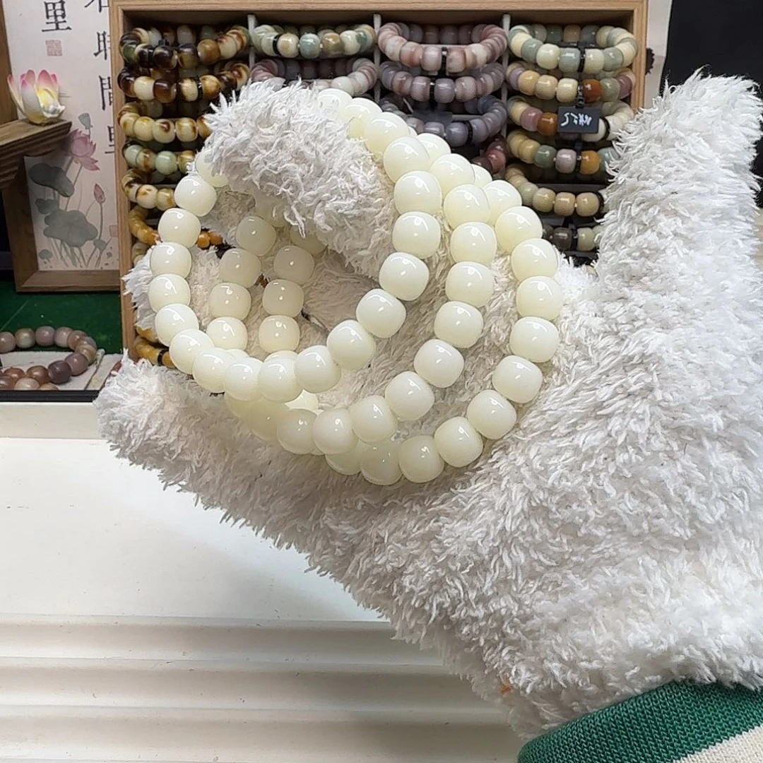 菩提根/象牙果吊坠瑕卡10白玉菩提根孔道一般