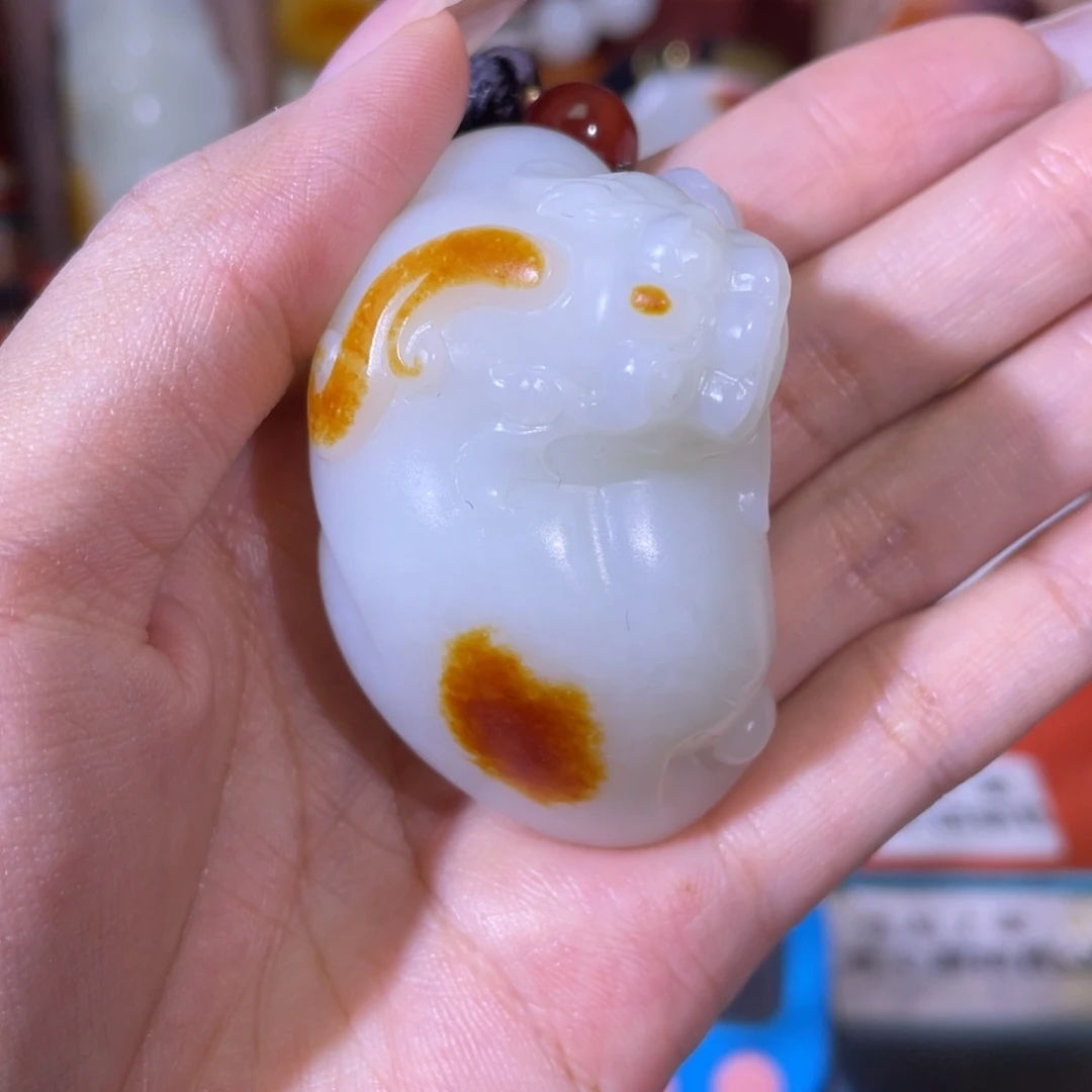 墨***。和田玉未镶嵌把件