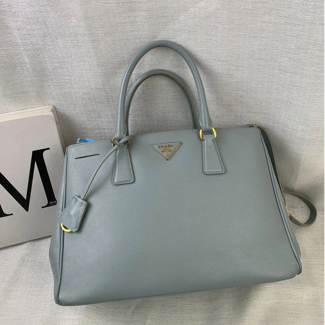 95新 Prada/普拉达 灰蓝色十字纹杀手包33/EE12804023/4023