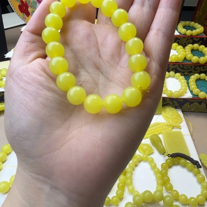 昭***哥合金新疆若羌黄口手串