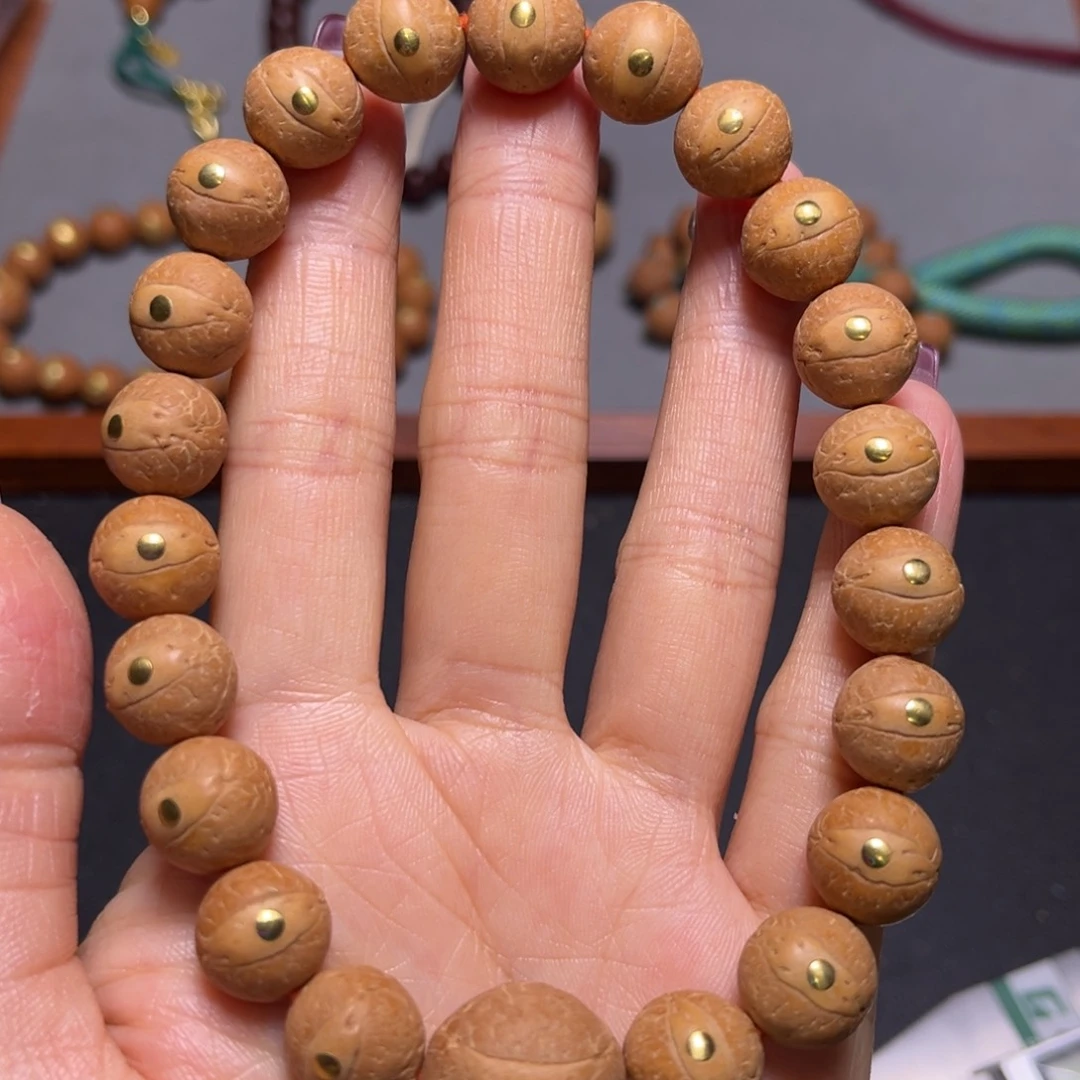 凤眼菩提吊坠12mm2025精品足球圆玉华皮铜钉手串