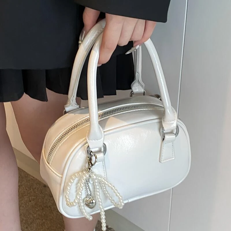 手提保龄球包女2024夏季新款韩版简约单肩包小众设计斜跨女包2016