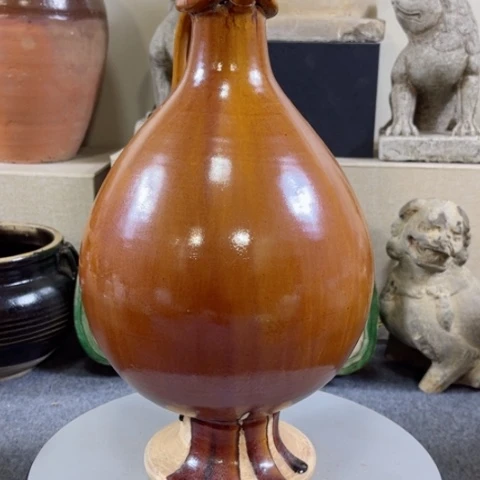 罐?**哥器型优美大方