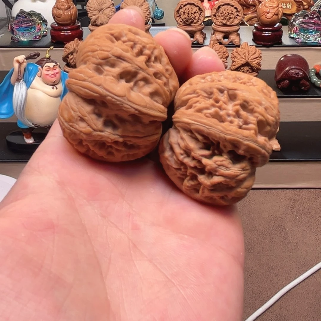 桃核把件44平谷元宝