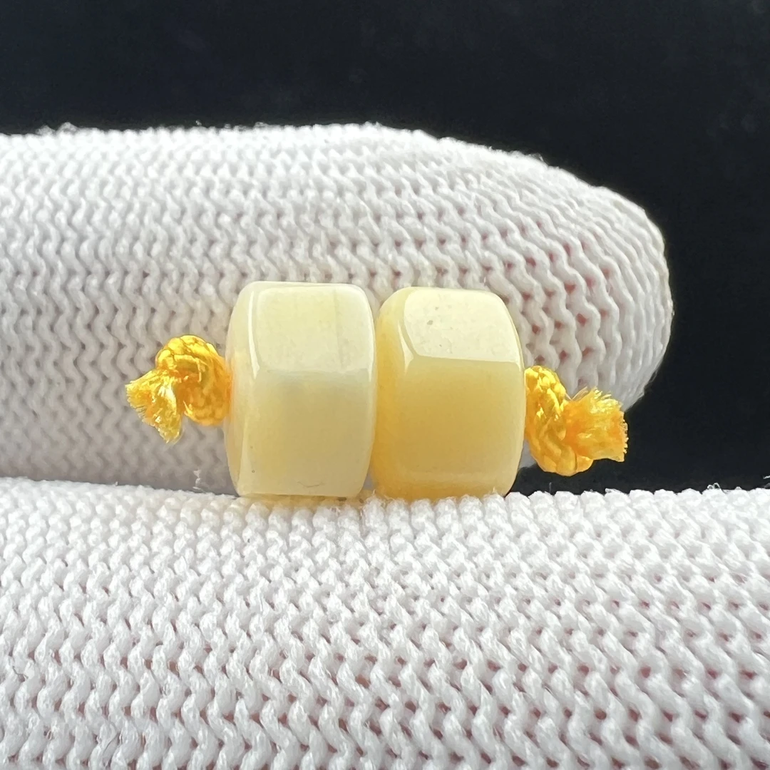 B5712天然原矿蜜蜡微瑕特价对珠9.3mm支持复检