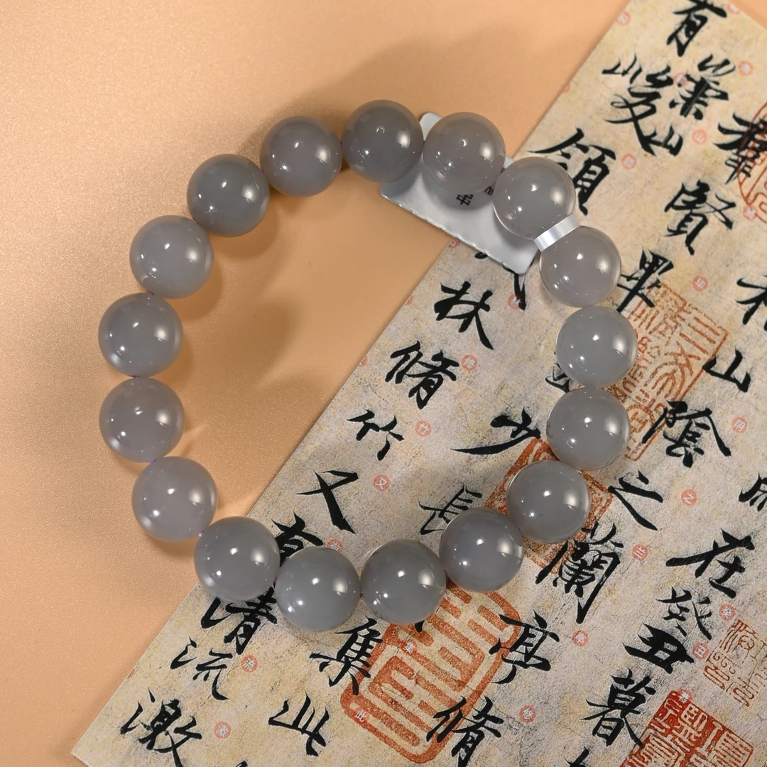Lot8802 25YU106812和田玉烟紫手串/保利
