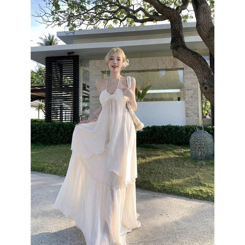 海边度假浪漫氛围感套装女设计感不规则挂脖吊带上衣A字飘逸长裙