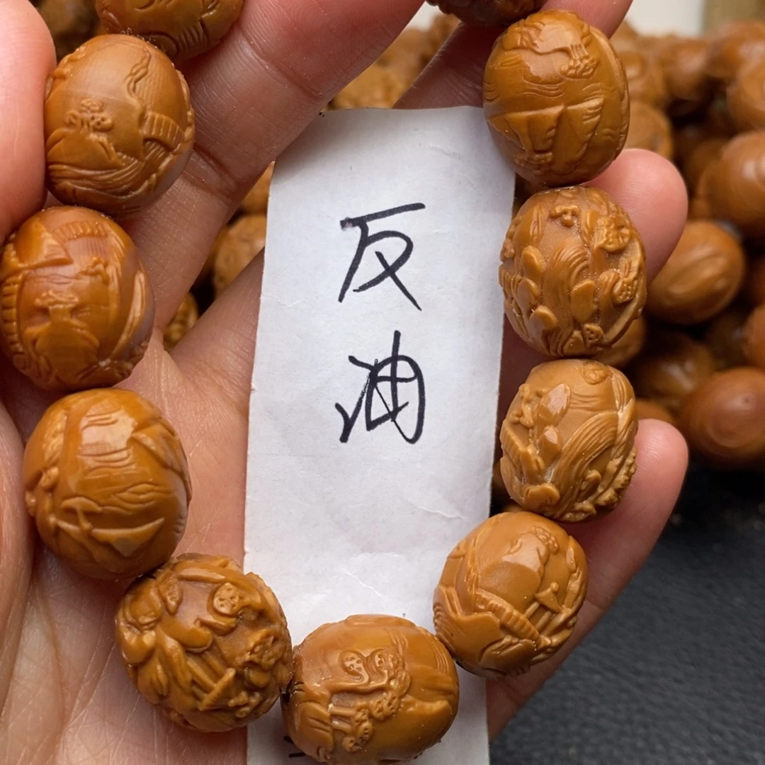 手串橄榄核鸽子蛋山水特价