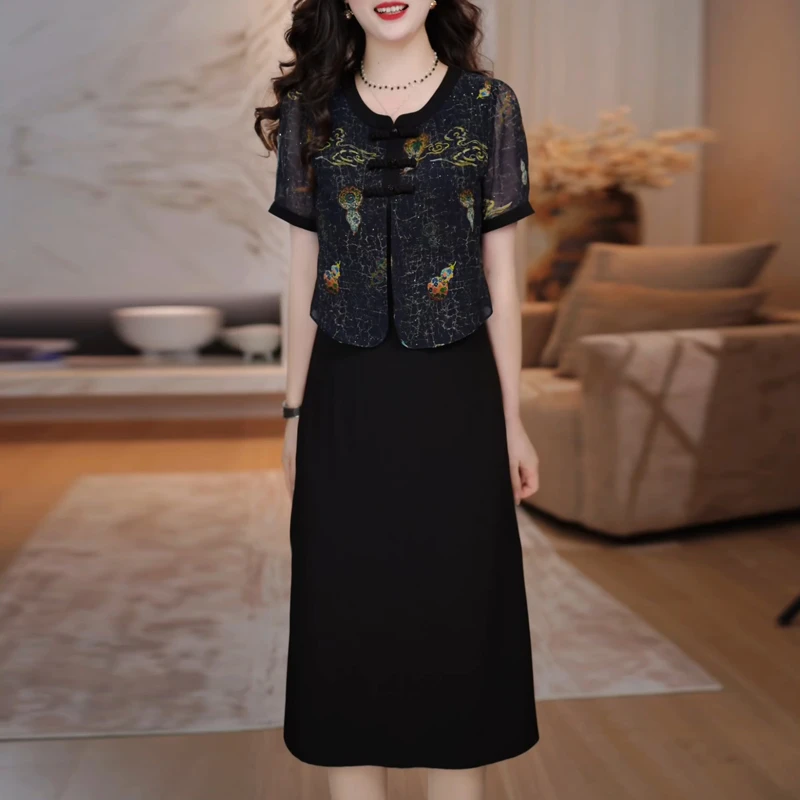 高端精致轻熟风连衣裙女2025夏季新款气质优雅显瘦假两件中长裙子