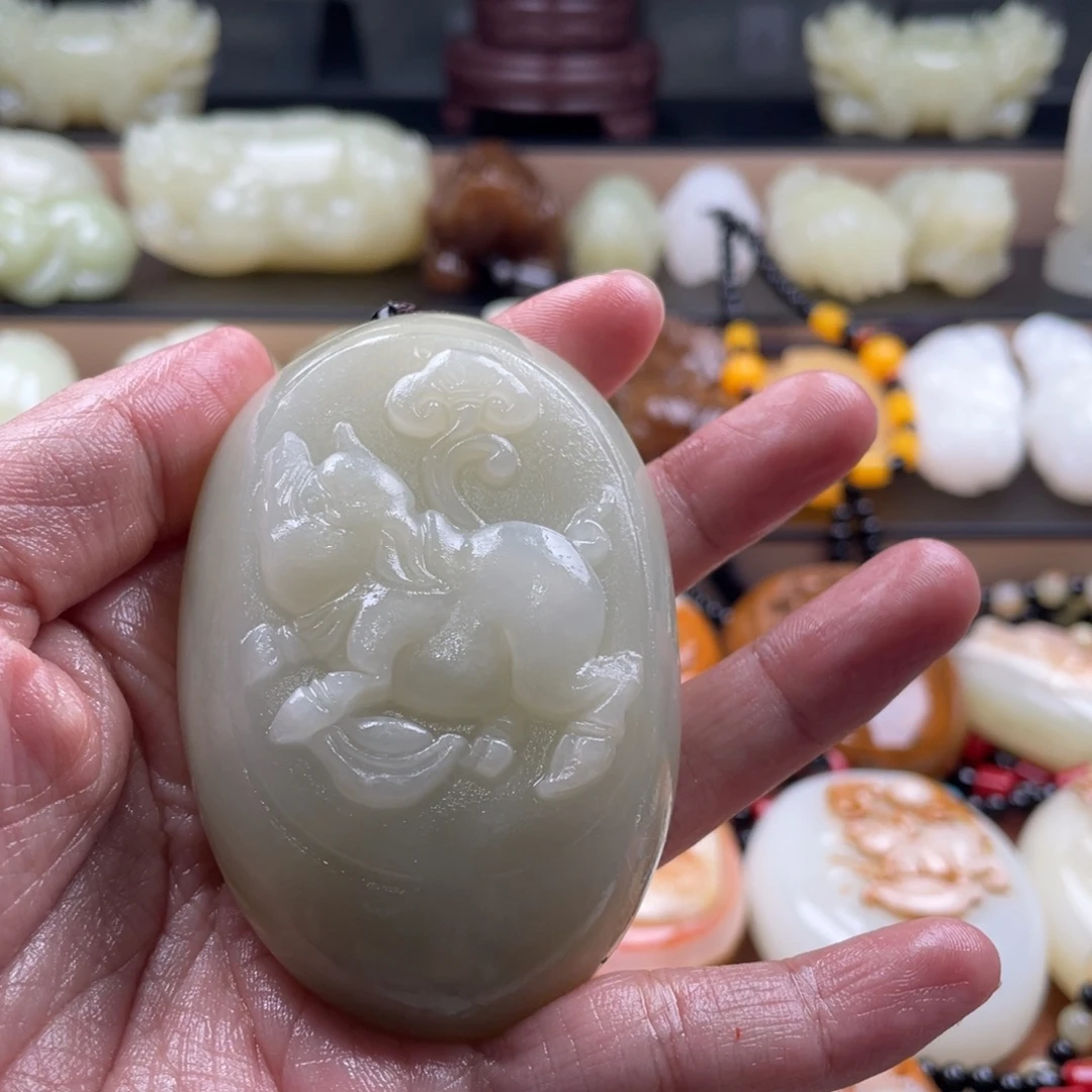 你***一石材古青石手把件