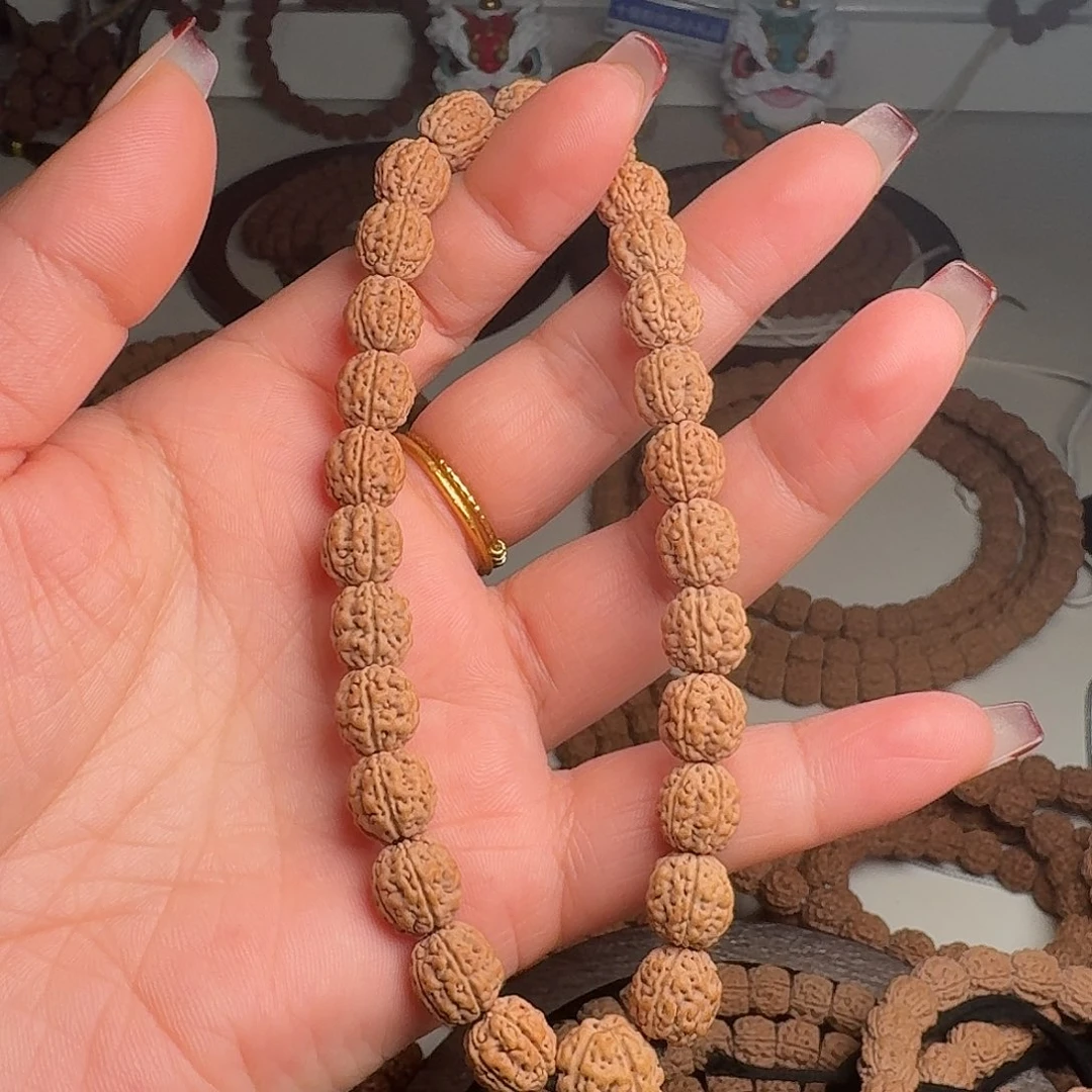 上***尼菩提籽类盘龙手持