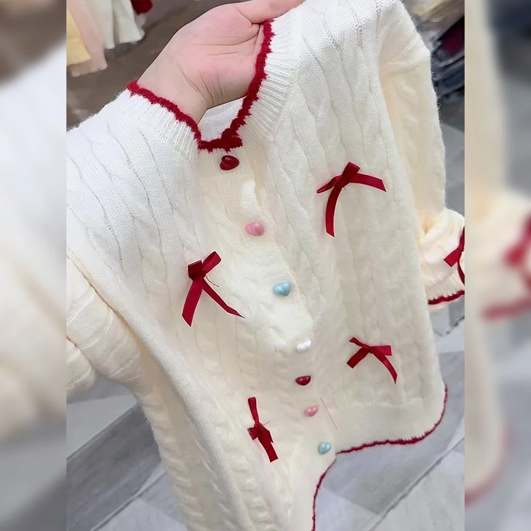 韩版立体蝴蝶结多巴胺纽扣针织衫2025秋季女装千金清冷感贵系衣服