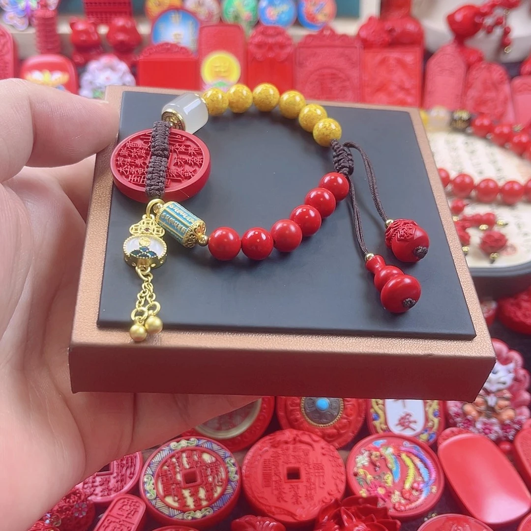 天然辰砂含辰砂工艺品山鬼花钱手绳