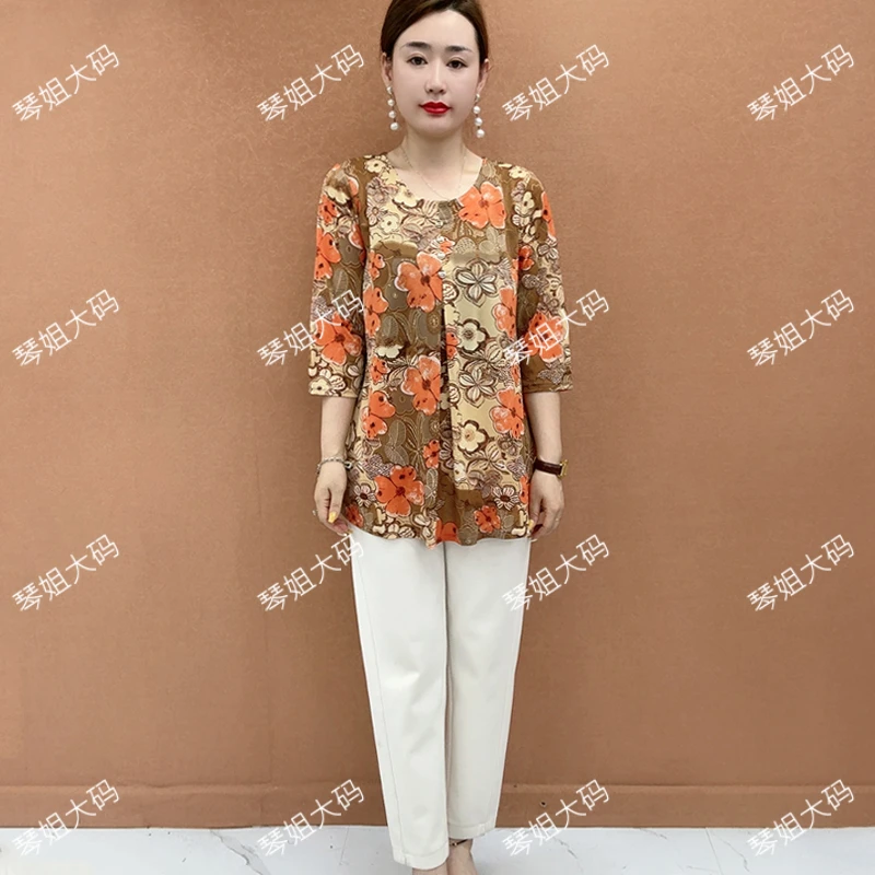 加肥加大码妈妈装宽松气质中老年女装显瘦遮肚子小衫花朵七分袖