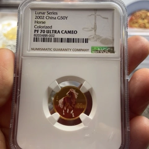 纯金2002年彩金马NGC70分带证书