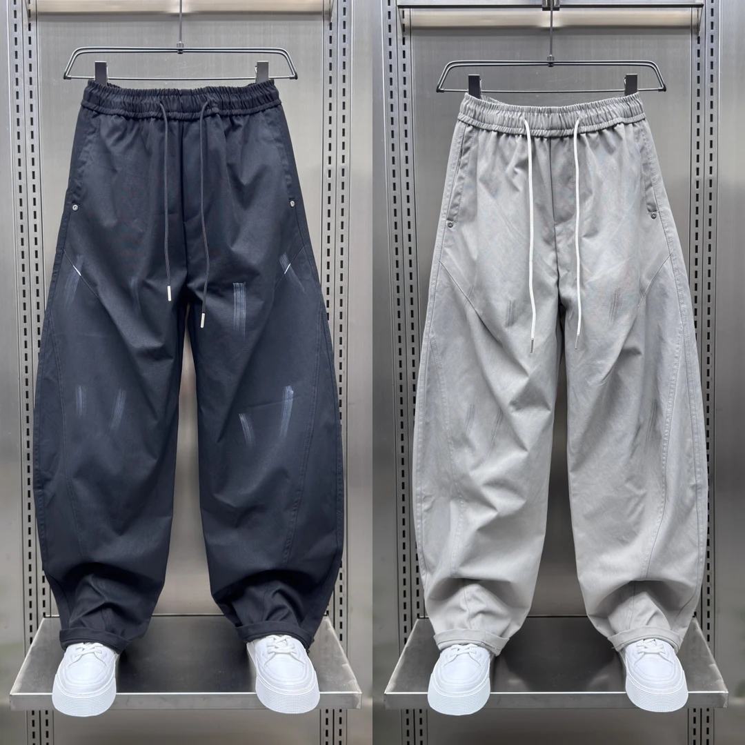 春秋季新款立体裁剪设计感泼墨休闲裤男士韩版时尚青年阔腿弯刀裤